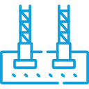Specialized equipment reaches beneath existing structures to create rectangular soil mix piers.